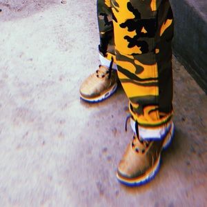 Gold women’s Nike AirMax Plus size 9